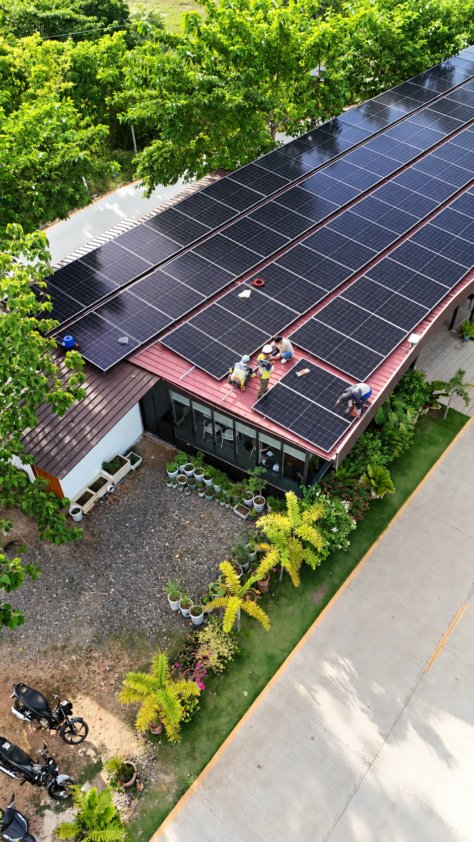 Solar technicians working on rooftop solar panels